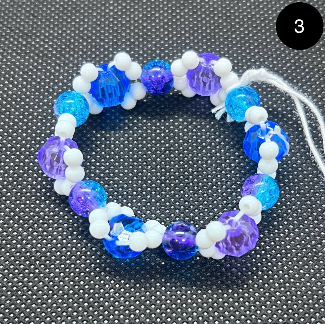 Set of 3 Beaded Pattern Bracelets - Pink Amethyst, Blue, and Purple.